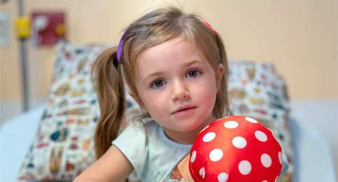 Kealy, patient holding toy